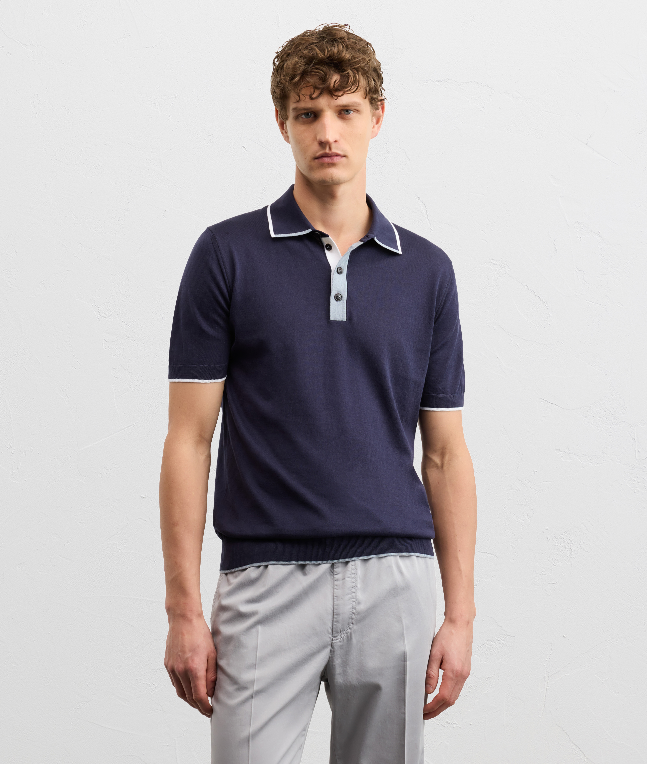 navy blue cotton knit short sleeved polo shirt with intarsia