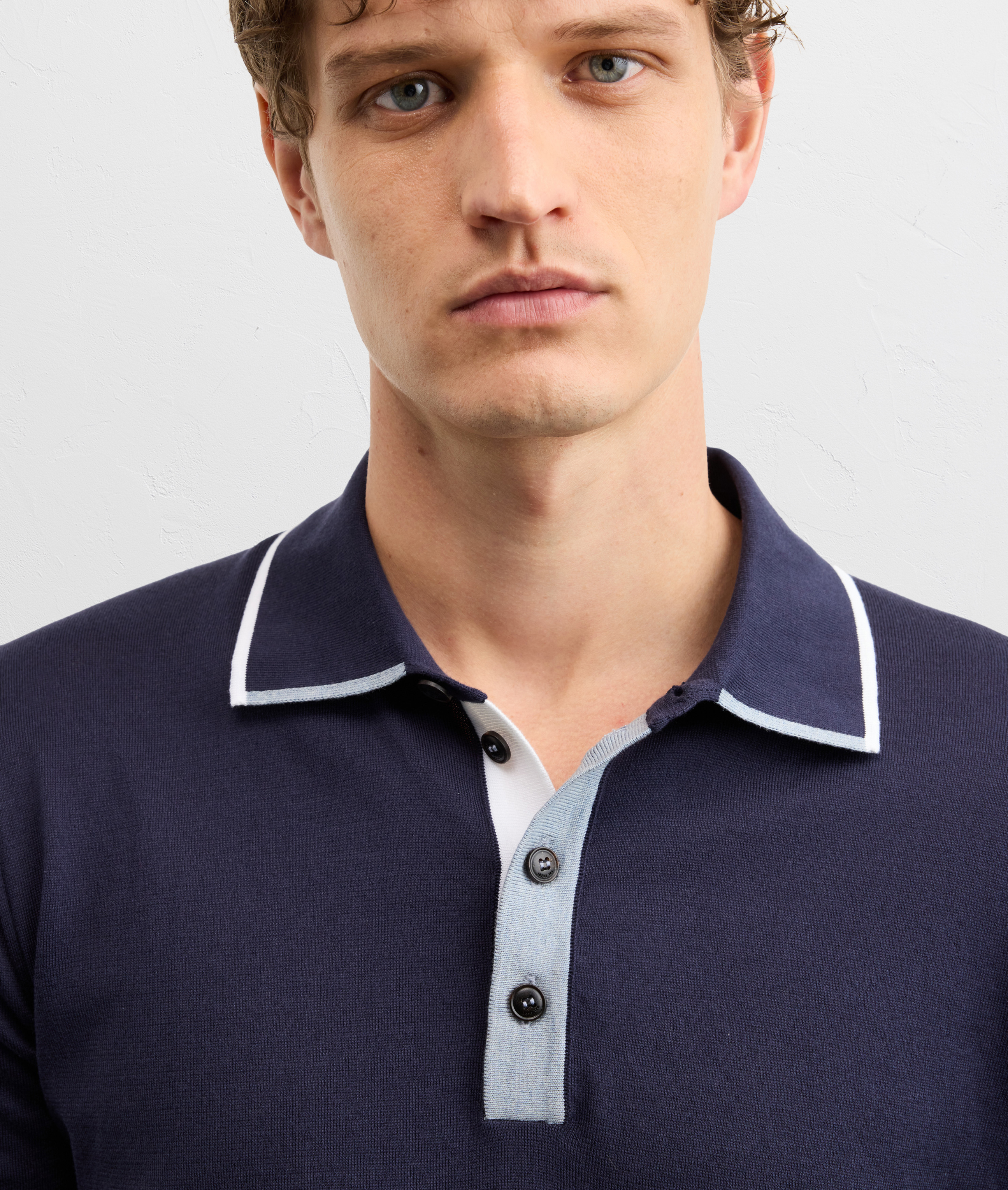 navy blue cotton knit short sleeved polo shirt with intarsia